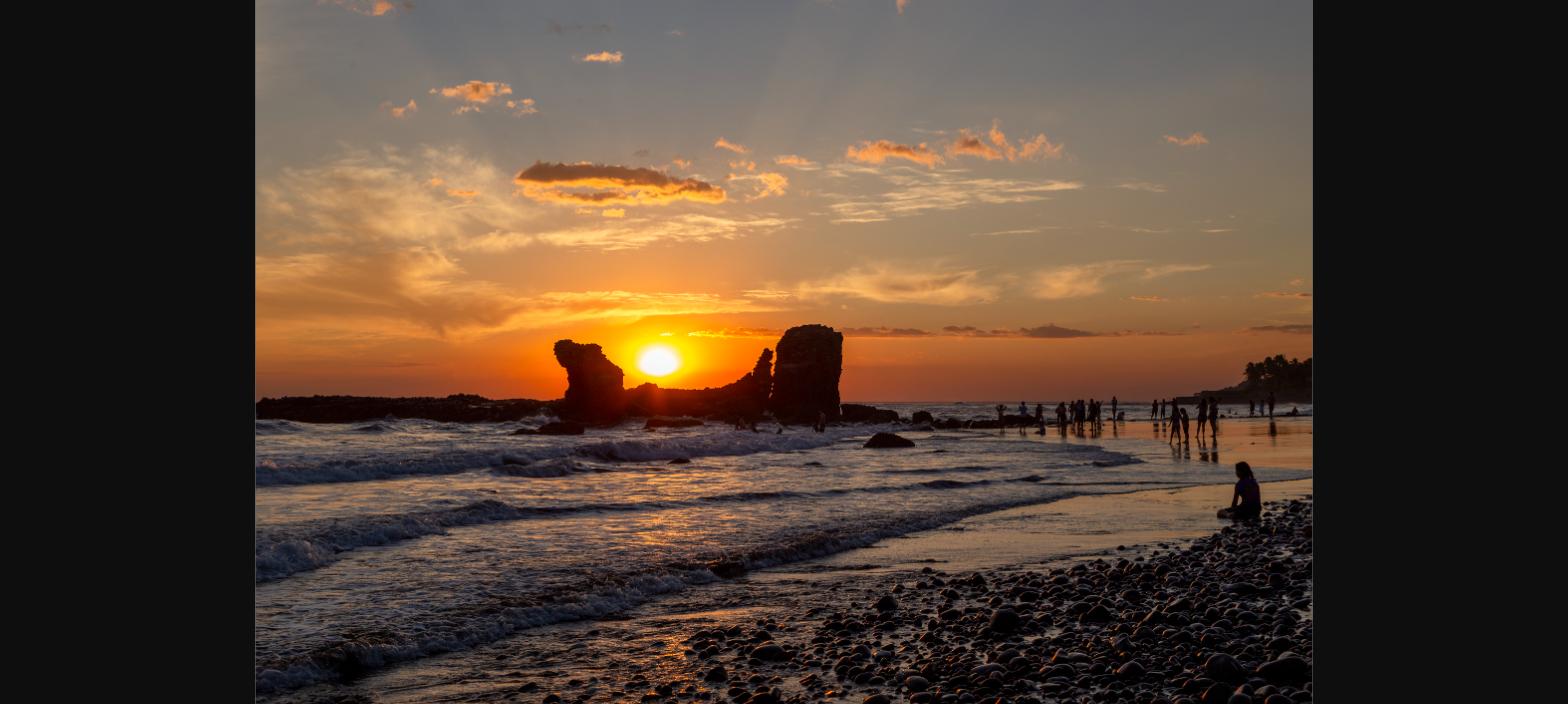 Sunset at El Tunco Beach, El Salvador - Montano & Company Law Firm